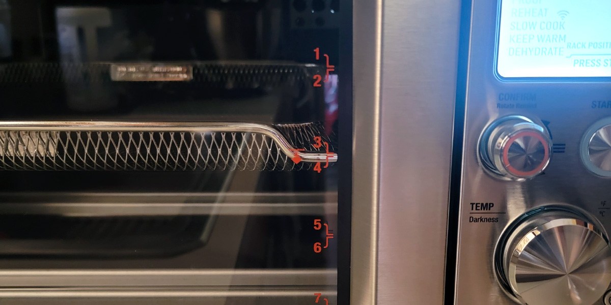 Closeup of Breville The Joule Oven Air Fryer's controls and cooking basket Closeup of Breville The Joule Oven Air Fryer's controls and cooking basket