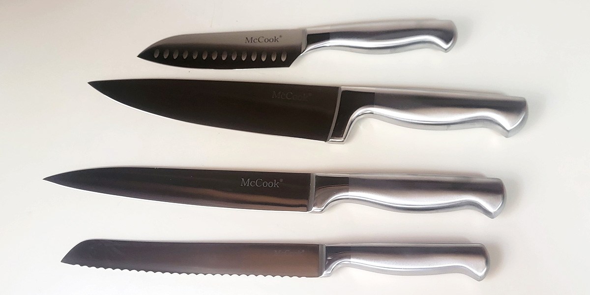 Top view of four McCook Knife Set knives on counter Top view of four McCook Knife Set knives on counter