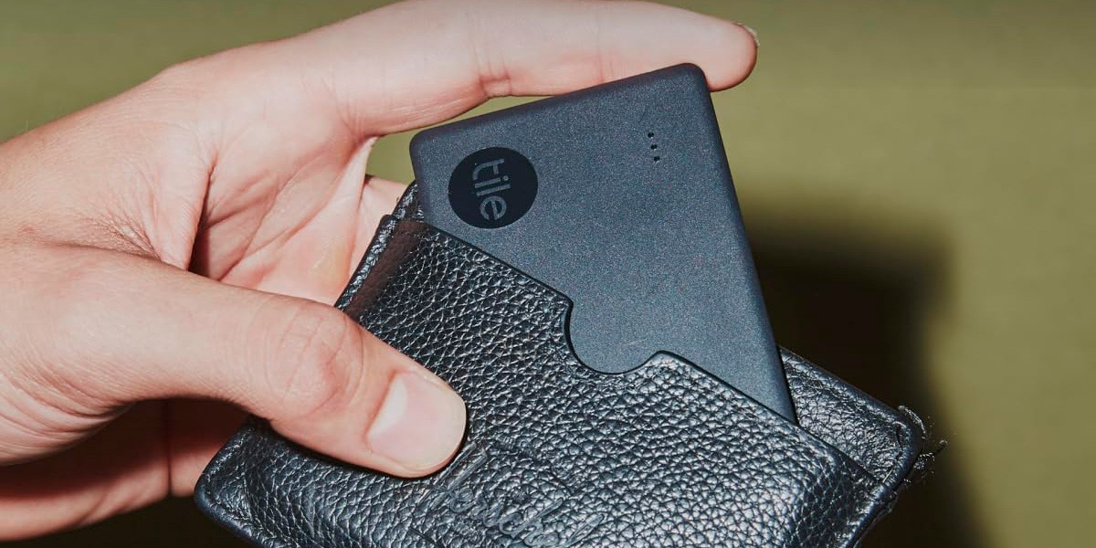 Hand holding Tile Slim