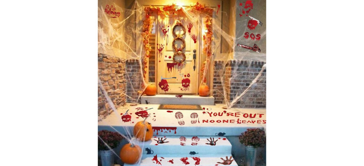 Front porch decorations with Halloween window clings and wall decorations