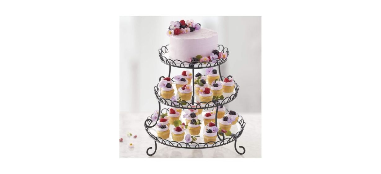 Wilton 3-Tier Customizable Scalloped Dessert Stand with cupcakes and a cake on the tiers