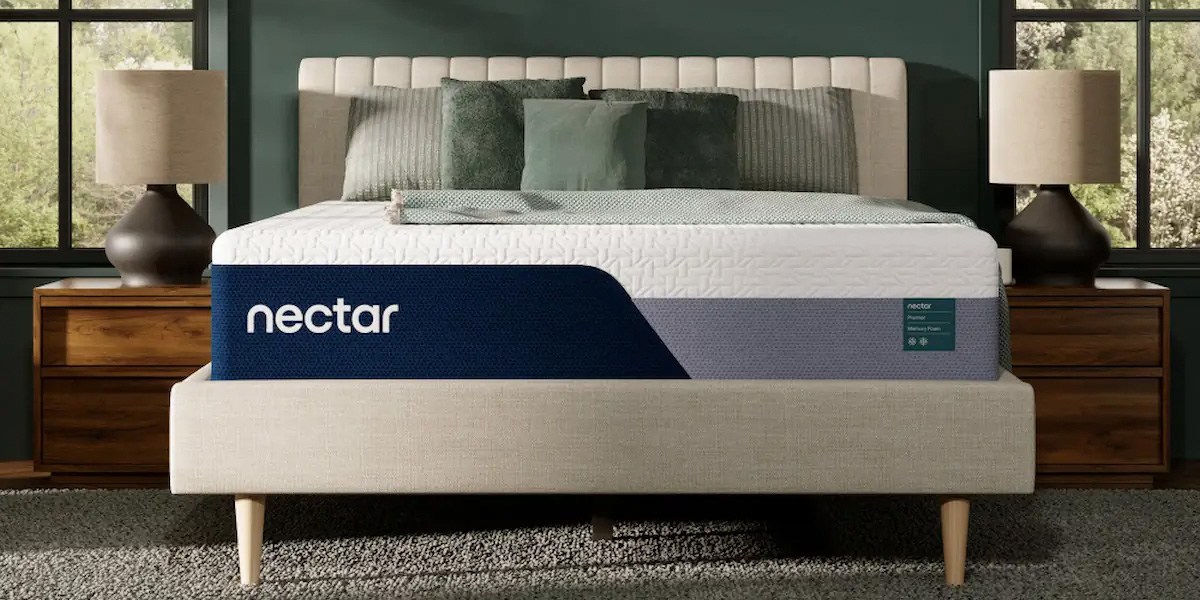 A bed with a Nectar brand mattress