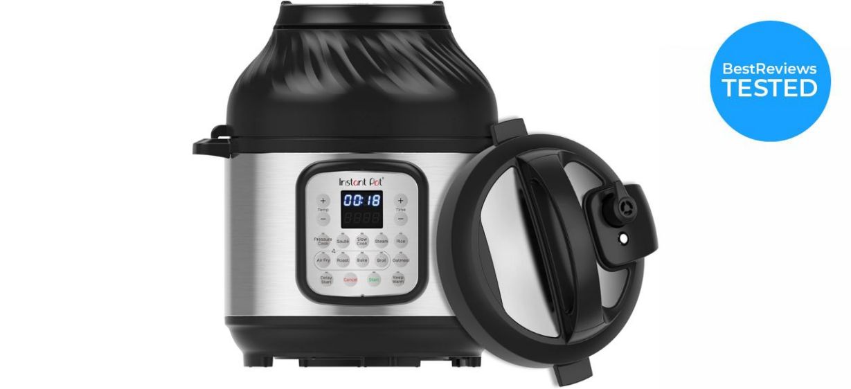 Aerial view of Instant Pot Duo Crisp with tater tots inside surrounded by dishes of food 